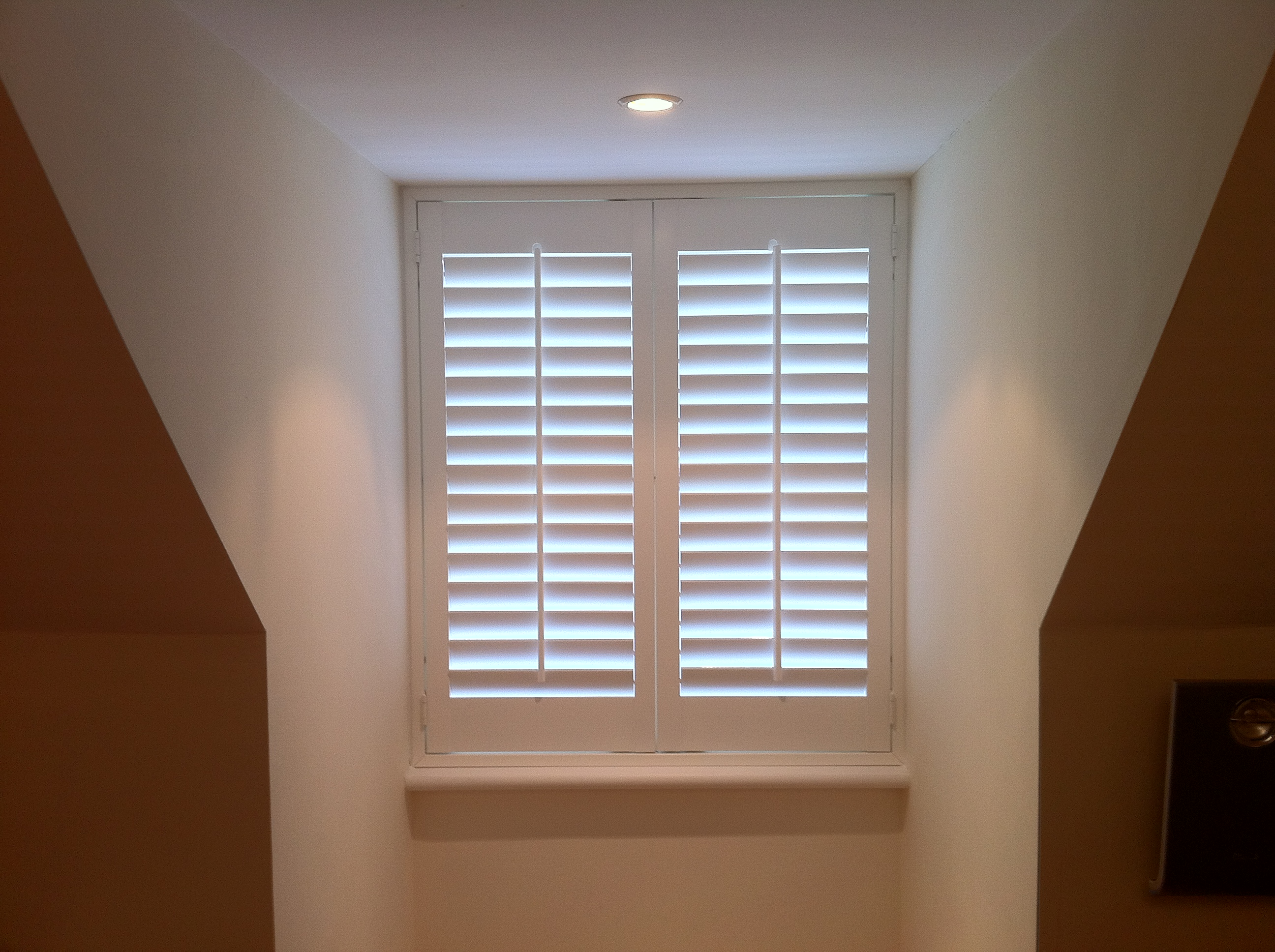 63mm louvre shutters fitted in town house in Hunsdon Hertfordshire  - Plantation shutters -  Carolina Blinds