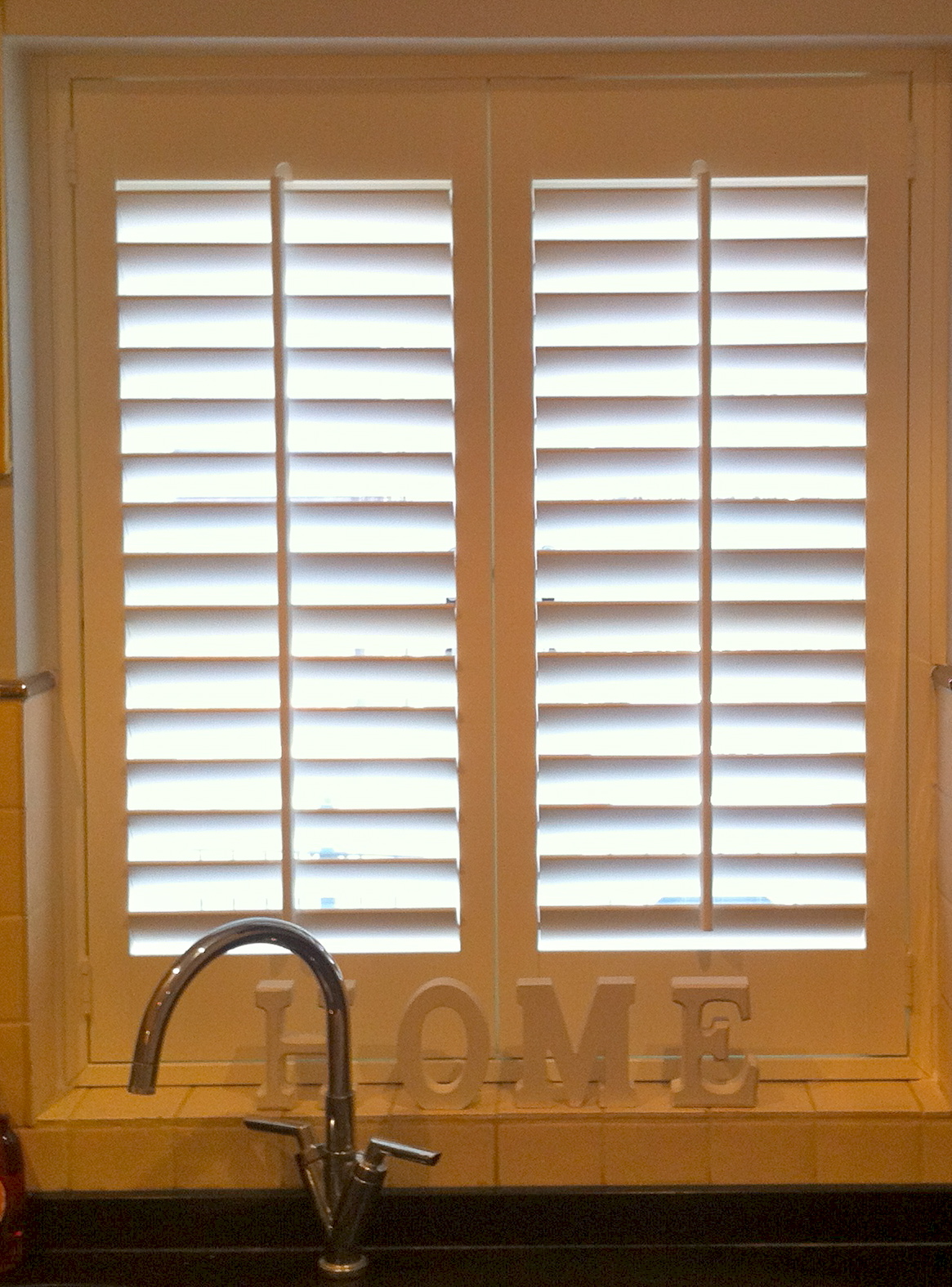 Shutters fitted inside recess in kitchen Much Hadham  - Plantation shutters -  Carolina Blinds