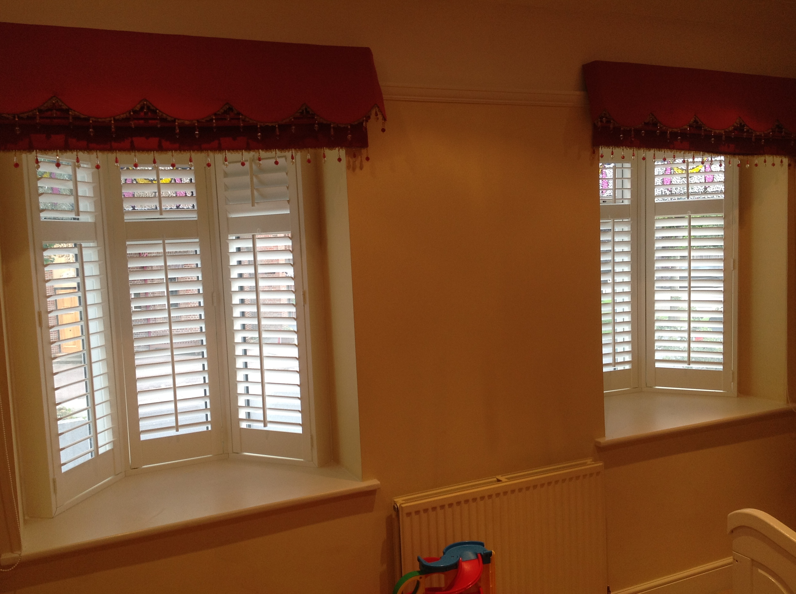 White Shutters fitted in Two bay windows, Winchmore Hill, London  - Plantation shutters -  Carolina Blinds