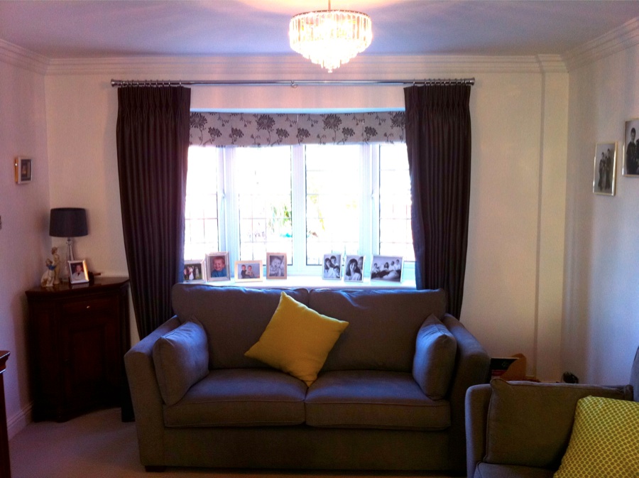 Roman blinds and pinch pleated curtains on chrome pole. Ware  - Soft furnishings -  Carolina Blinds