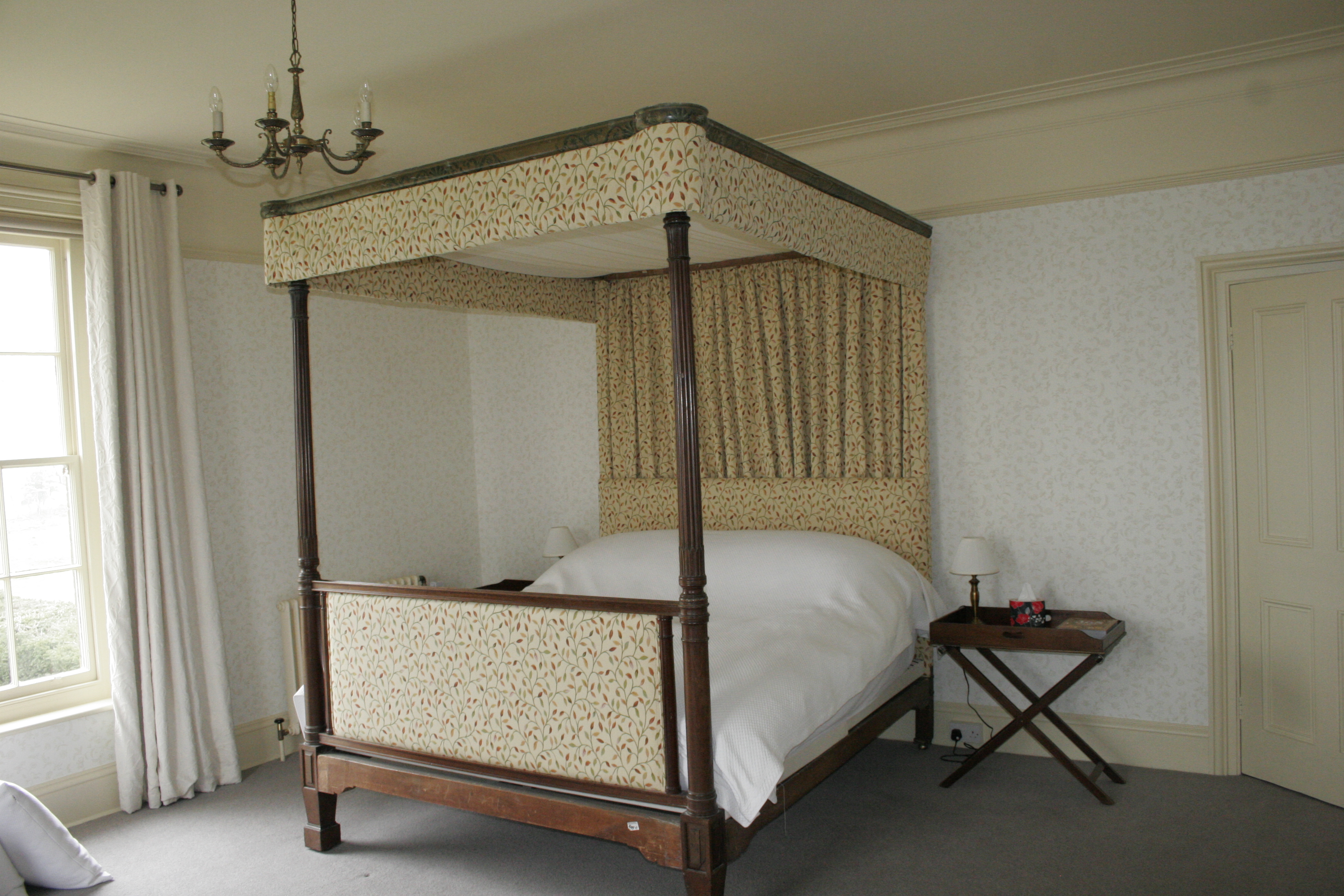 Four poster bed with voile tented ceiling, soft pelmet, back curtain and upholstered headboards. Bocking Near Braintree  - Soft furnishings -  Carolina Blinds